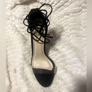 Lulus black lace up heels.